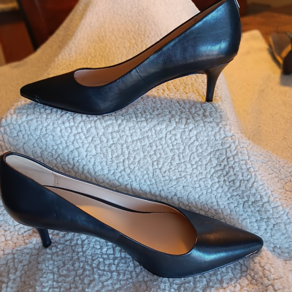 Black kitten heels, minor scratches on 1 heel.
